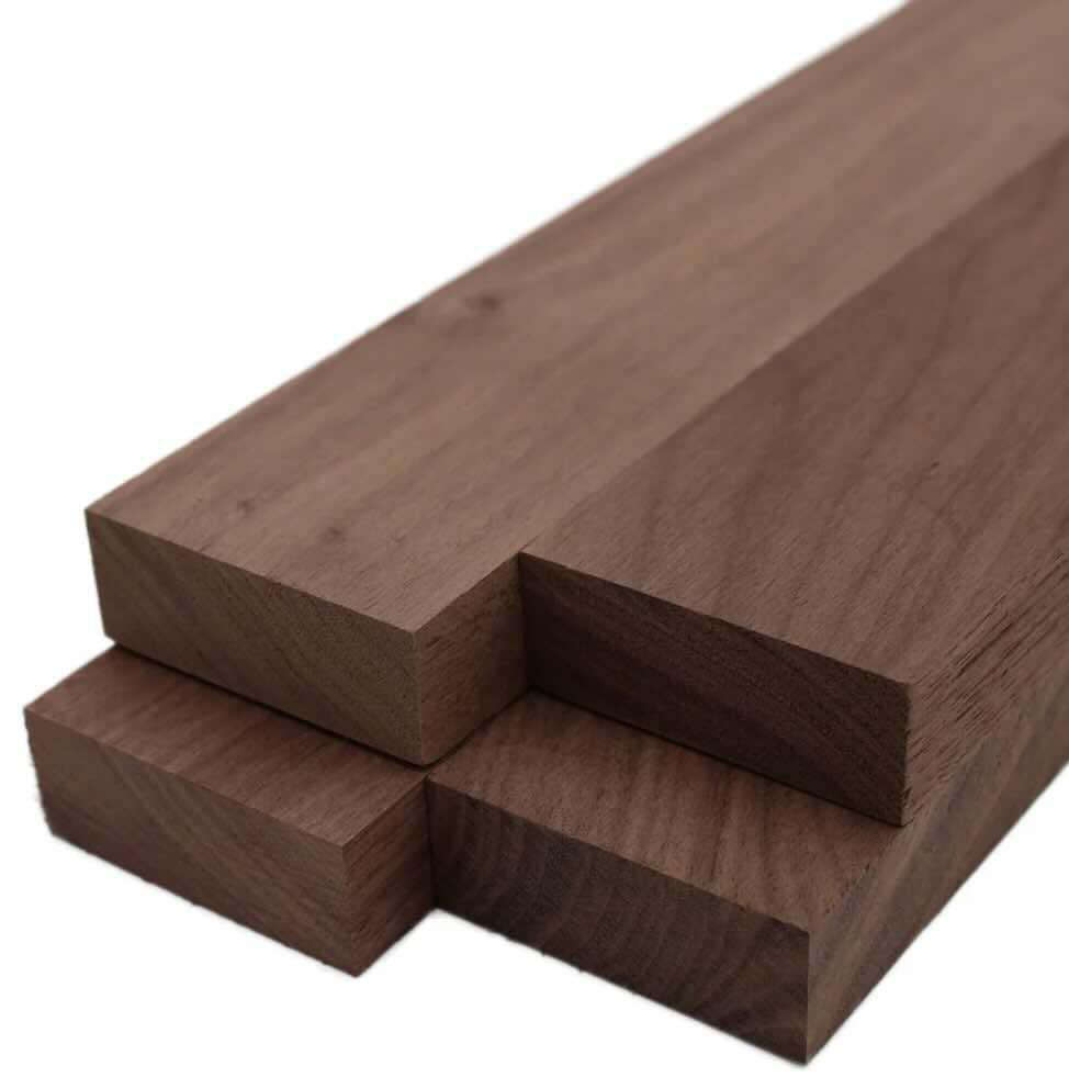 Black walnut boards showing naturally rich brown color and flowing grain