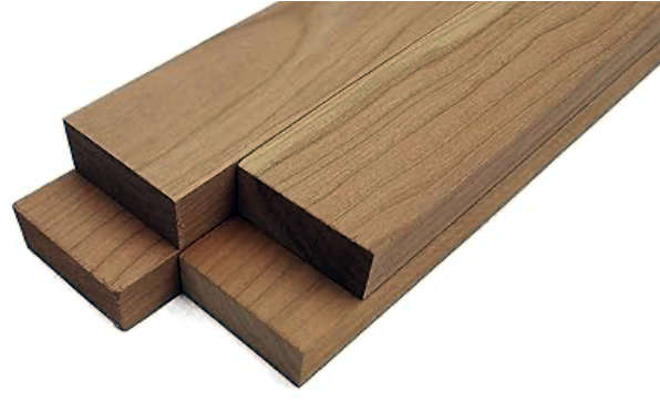 Cherry hardwood boards showing warm reddish color and smooth grain
