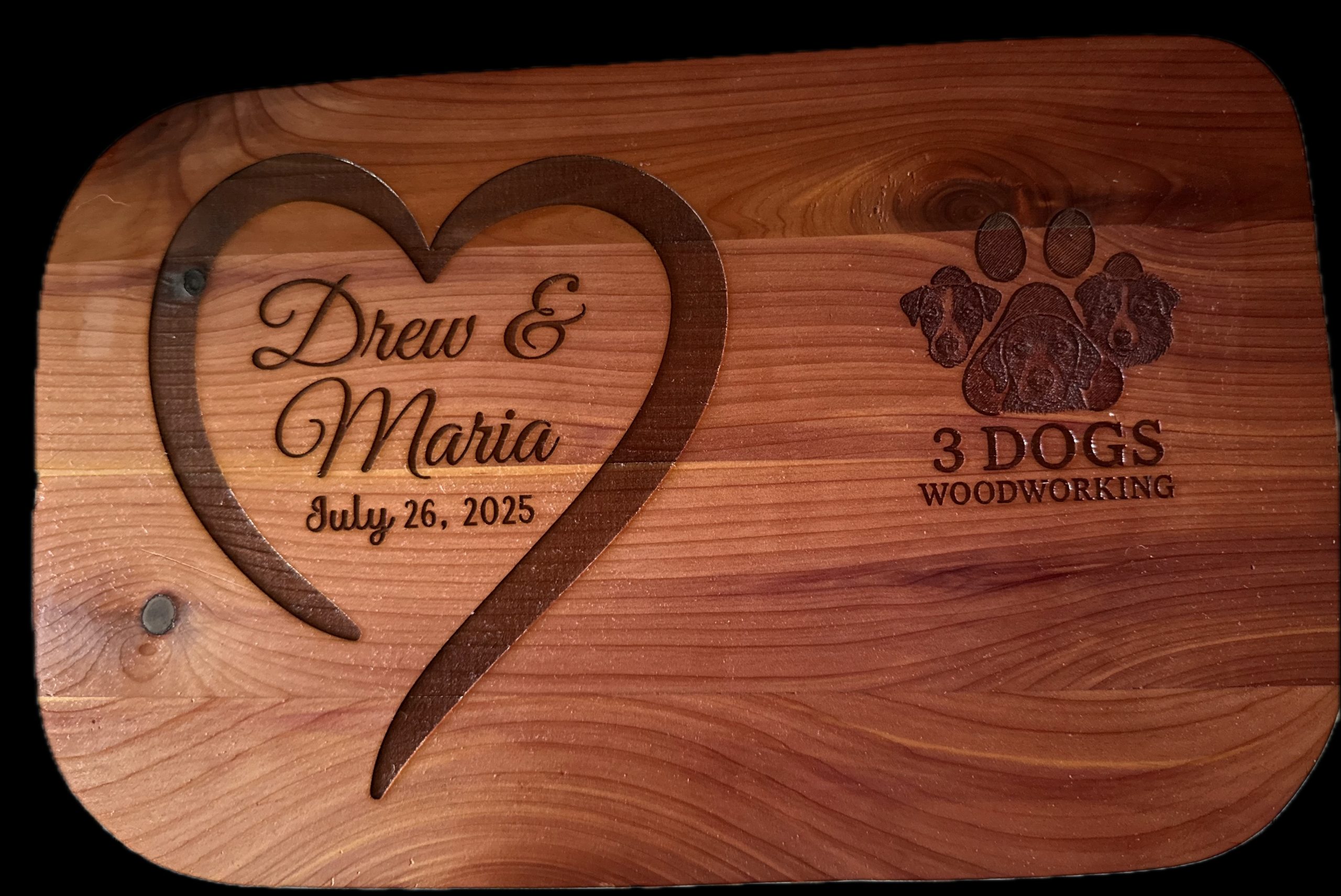 Back of rectangular cedar cribbage board showing its integrated storage compartment