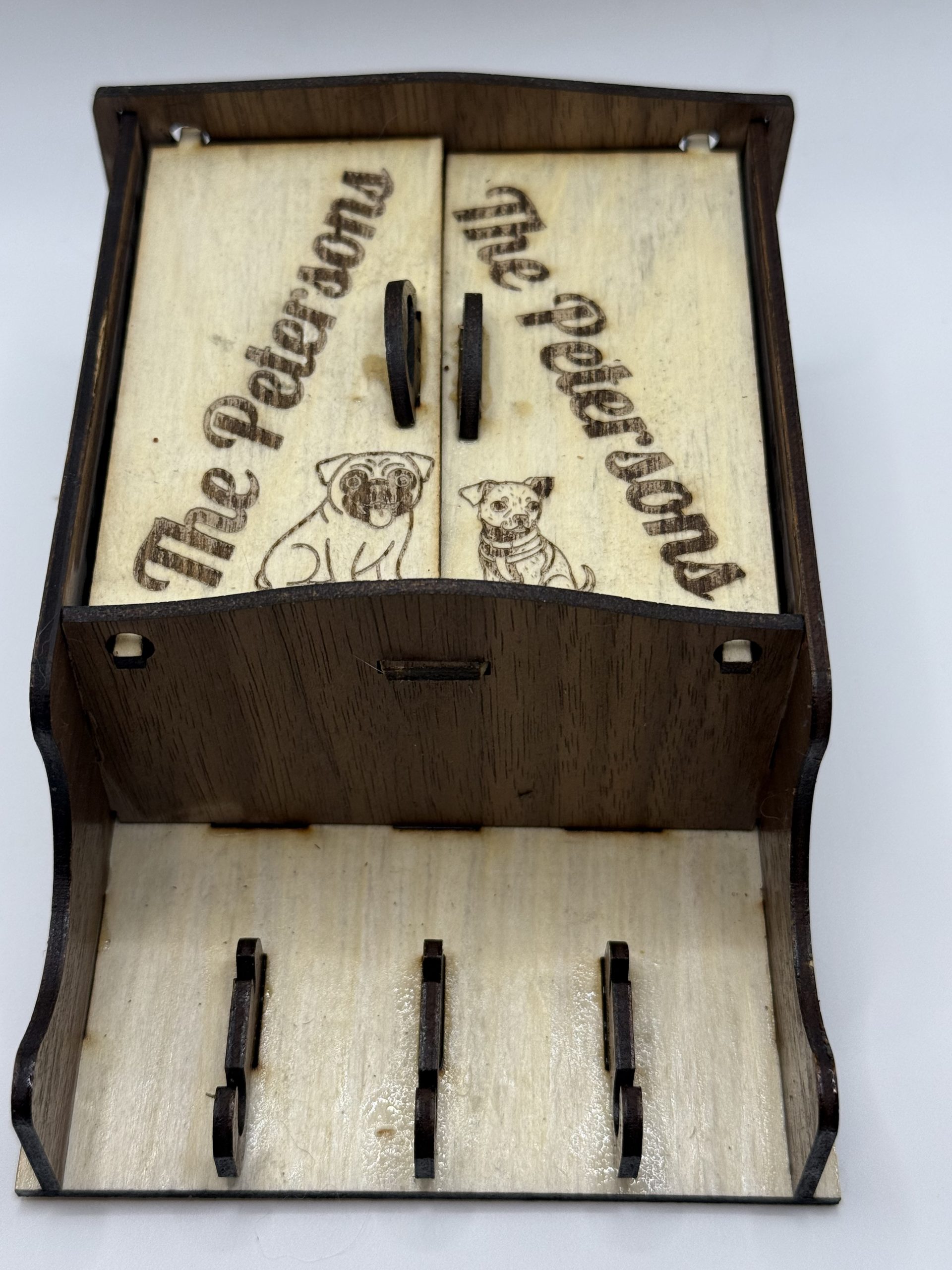 Custom maple and walnut wall key holder with laser-cut and engraved personalized details