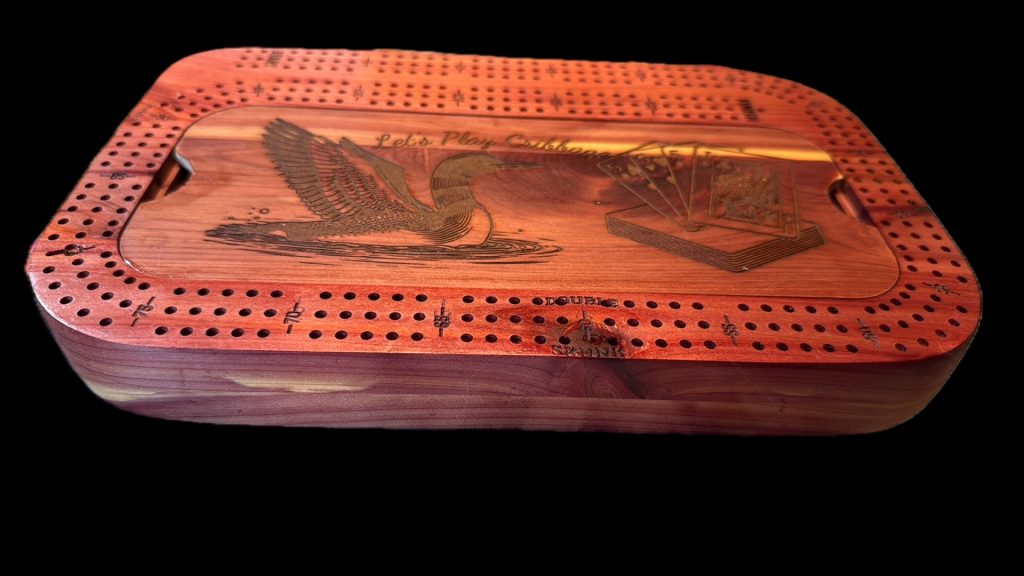 Custom engraved cribbage boards with optional built-in card and peg storage in a variety of wood styles and formats