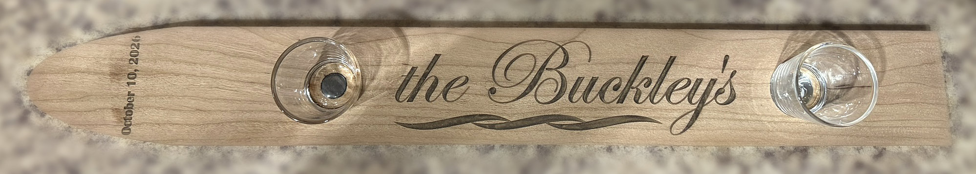 Personalized cherry hardwood Shotski wedding gift with engraved Buckley name, gold pearlescent epoxy inlay, and magnetic shot glasses